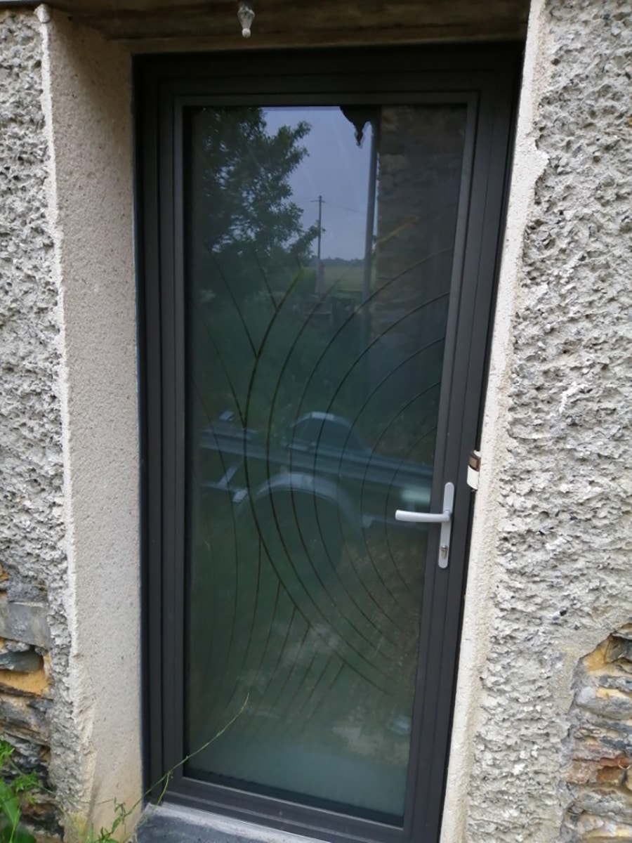 Porte d'entrée aluminium grand jour