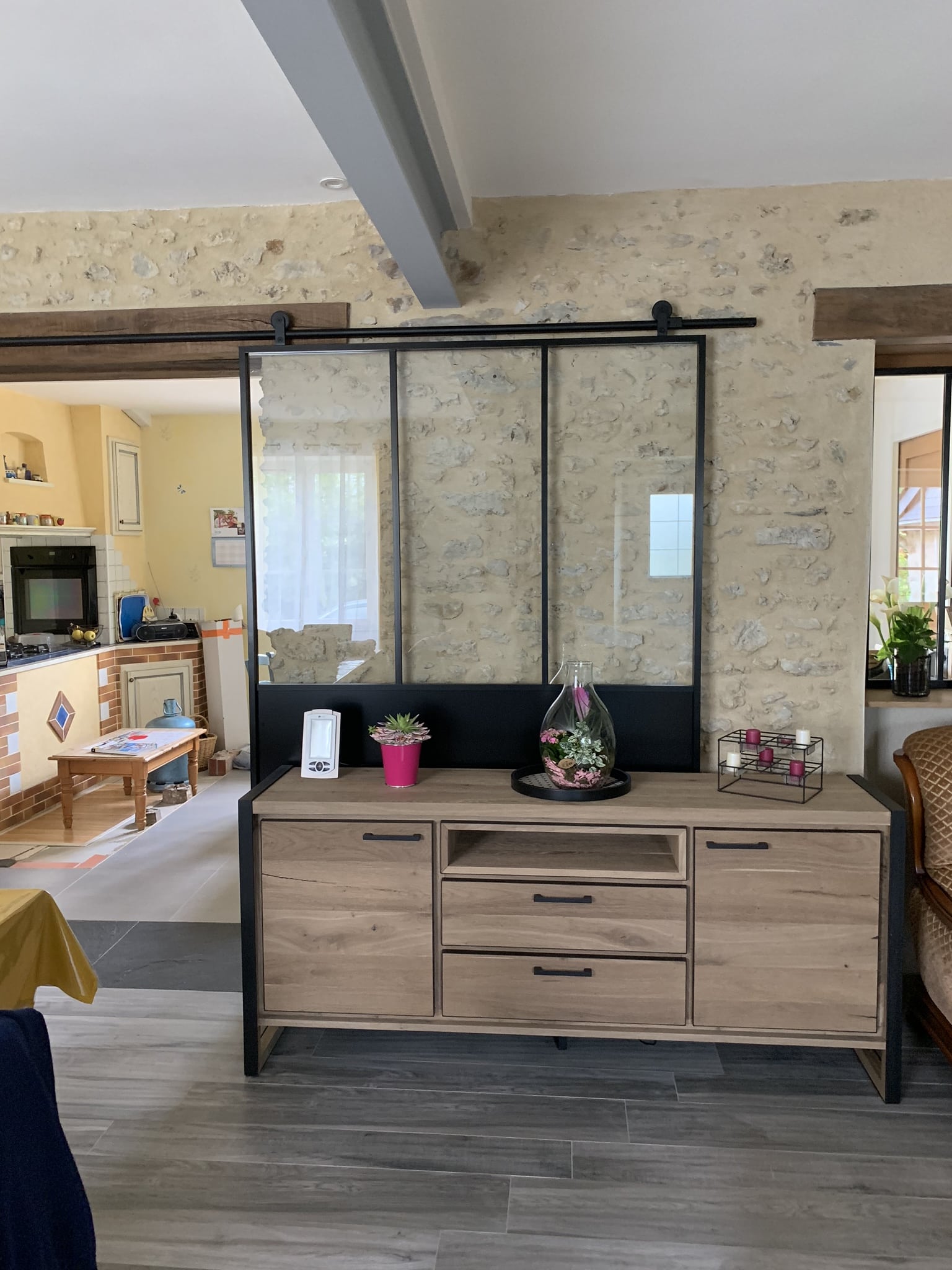 Création d'une verrière coulissante dans une maison ancienne